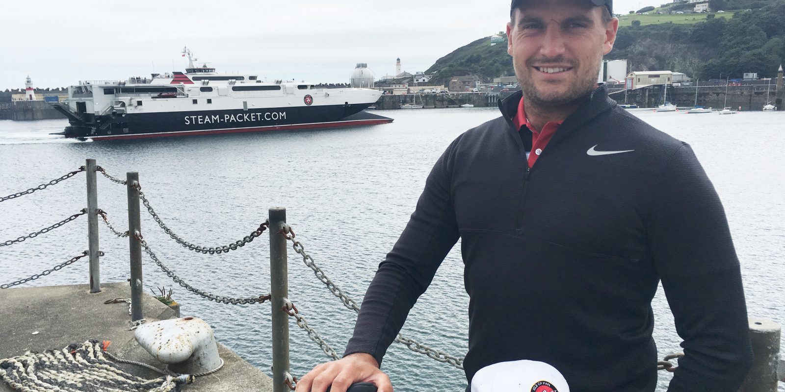 Tom Gandy with fast craft Manannan (ferry) in the background